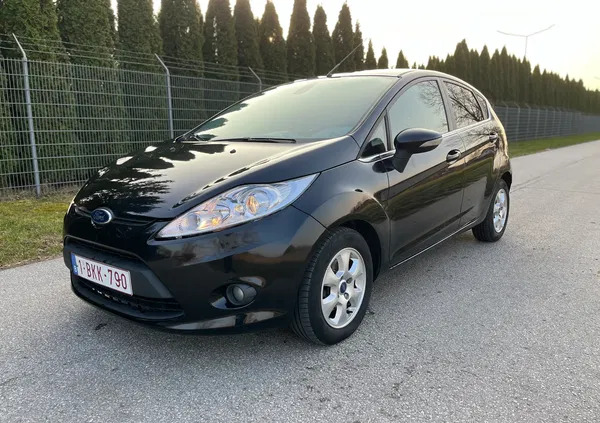 łódzkie Ford Fiesta cena 16900 przebieg: 175342, rok produkcji 2011 z Opoczno